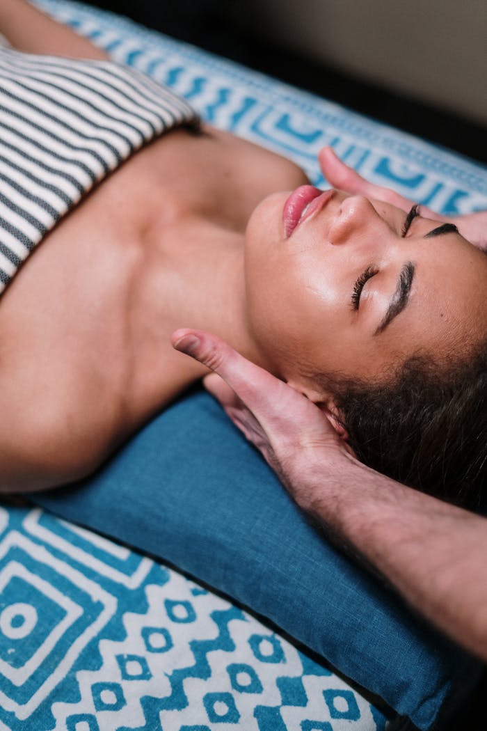 about-06 Indulge in a calming facial massage in a luxury spa setting, promoting relaxation and wellness.